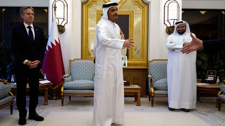 Qatar’s Prime Minister and Foreign Minister Mohammed bin Abdulrahman Al Thani (C) and US Secretary of State Antony Blinken (L) in Doha - Jacquelyn Martin/POOL/AFP via Getty Images