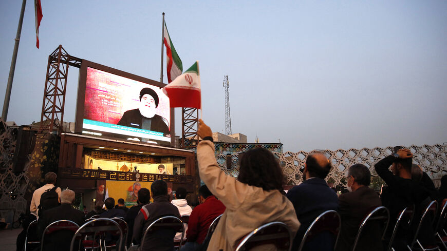 People gather in the Imam Hussein square in Tehran, during the televised speech of Lebanese Hezbollah chief Hassan Nasrallah November 3, 2023. Nasrallah told the United States on November 3, that his Iran-backed group was ready to face its warships and the way to prevent a regional war was to halt the attacks in Gaza. (Photo by AFP) (Photo by -/AFP via Getty Images)