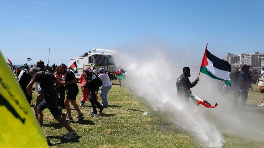 South African police fire water cannon towards pro-Palestinian supporters in Cape Town 