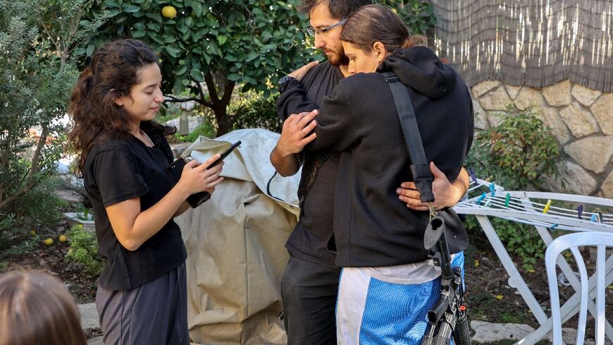 The family of Israeli Yuval Kestelman mourns in Kiryat Tivon, in northern Israel, after his death in Jerusalem