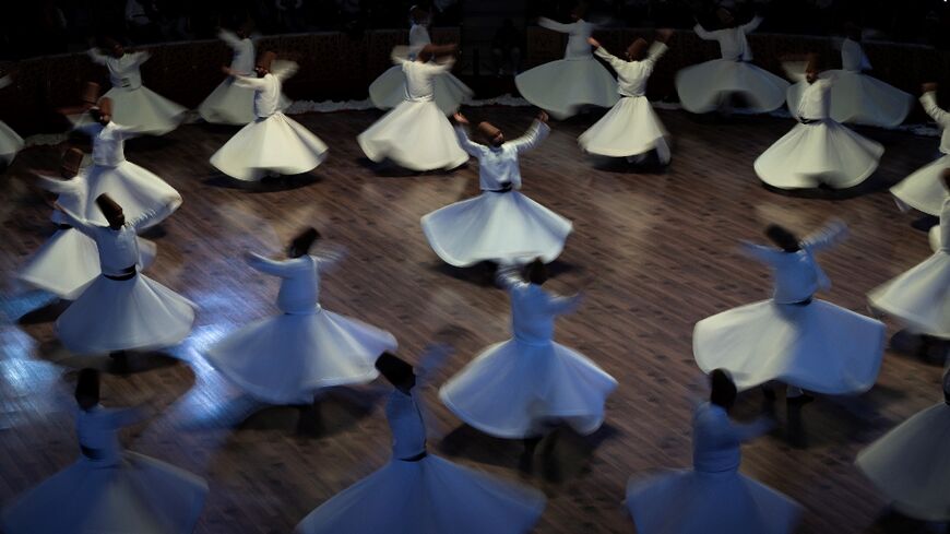 Whirling dervishes perform dances celebrating the teachings of mystic Sufi poet Rumi