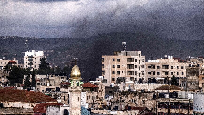 Smoke billowing from the Jenin refugee camp during the Israeli raid