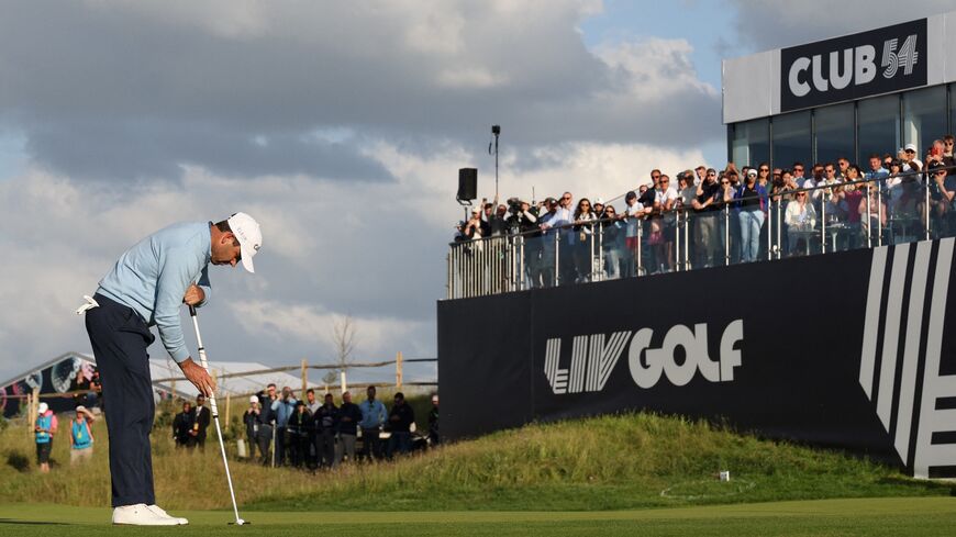 South African golfer Charl Schwartzel plays a last shot on the 18th hole during the third and final day of the LIV Golf Invitational Series event at The Centurion Club in St Albans, north of London, on June 11, 2022.