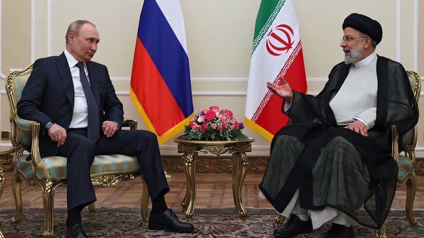 Russian President Vladimir Putin and Iran's President Ebrahim Raisi hold a meeting in Tehran on July 19, 2022. - Iran's president will host his Russian and Turkish counterparts for talks on the Syrian war in a three-way summit overshadowed by fallout from the Russian invasion of Ukraine. (Photo by Sergei SAVOSTYANOV / SPUTNIK / AFP) (Photo by SERGEI SAVOSTYANOV/SPUTNIK/AFP via Getty Images)