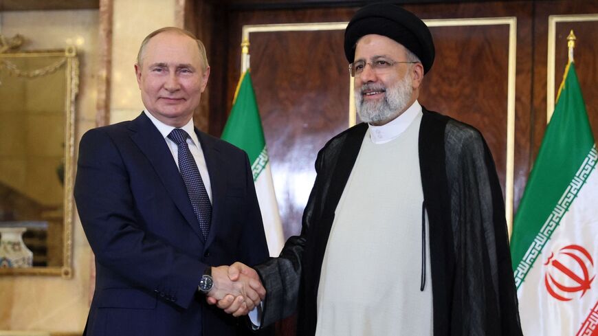 Russian President Vladimir Putin and Iran's President Ebrahim Raisi hold a meeting in Tehran on July 19, 2022.