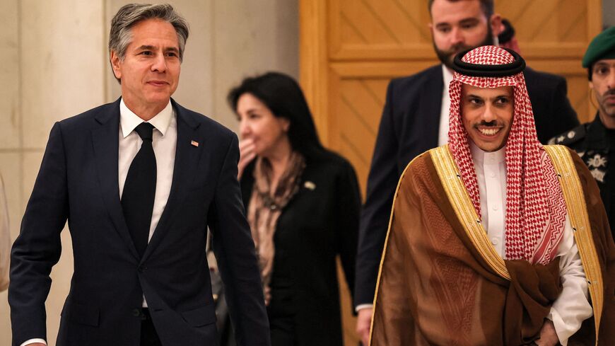 Saudi Foreign Minister Faisal bin Farhan (R) escorts US Secretary of State Antony Blinken as they arrive for a meeting with GCC Ministers at the GCC Secretariat in Riyadh on June 7, 2023.