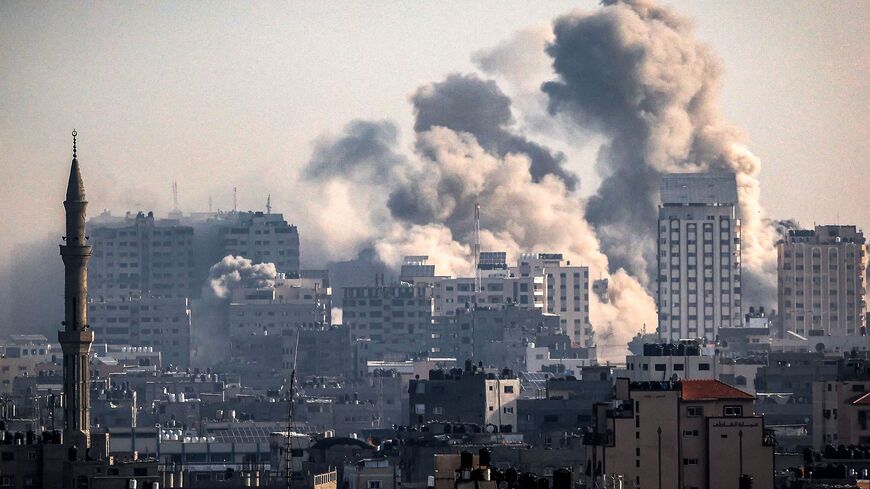 Smoke plumes billow during Israeli air strikes in Gaza City on October 12, 2023 as raging battles between Israel and the Hamas movement continue for the sixth consecutive day. Washington urged Israel to show restraint in its response to Hamas's surprise attack -- the worst in the country's 75-year history -- which Israeli forces said killed more than 1,200 people, mostly civilians. In Gaza, officials have reported more than 1,200 people killed in Israel's uninterrupted campaign of air and artillery strikes,