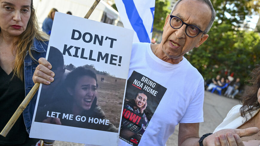 Yakov Argamani, father of 26-year-old Israeli hostage Noa Argamani, speaks to media outside the Tel Aviv Museum of Art, now informally called the "Hostages Square", in Tel Aviv on Dec. 16, 2023, amid continuing battles between Israel and the Palestinian militant group Hamas. The Israeli army was on December 16 investigating the killing of three hostages which it said had been mistakenly identified as a threat by soldiers, an incident that sparked protests in Tel Aviv. 