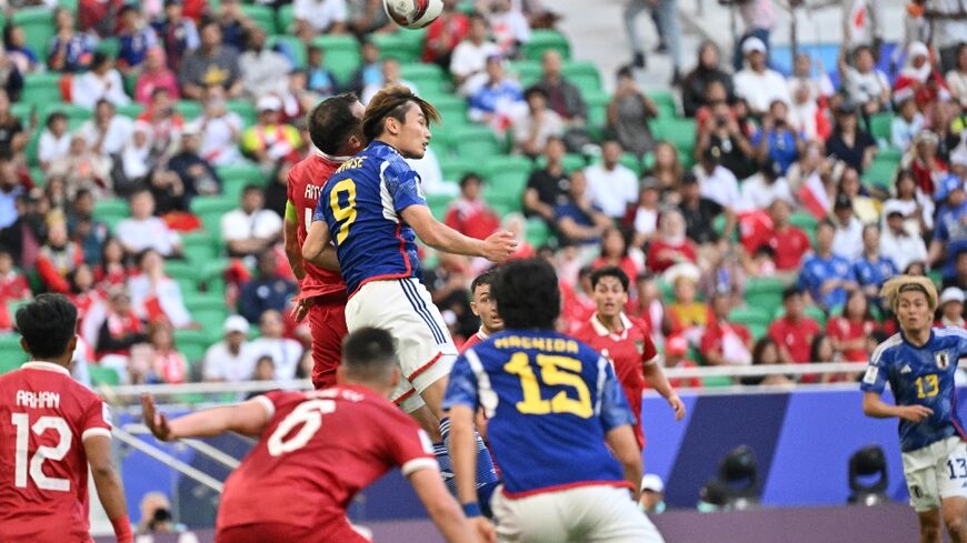 Japan forward Ayase Ueda scored twice