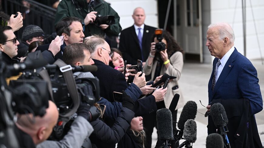 US President Joe Biden speaks to reporters before boarding Marine One on the South Lawn of the White House