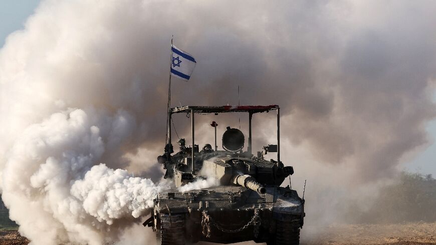 An Israeli army tank is seen in southern Israel along the border with the Gaza Strip