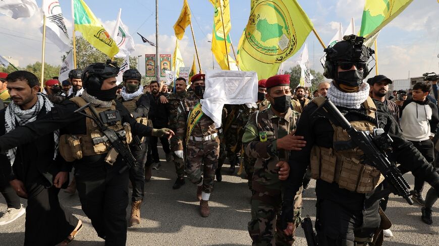 Hundreds of people waving the flags of pro-Iran groups attended on Thursday the Baghdad funeral of one fighter killed in the latest US strikes