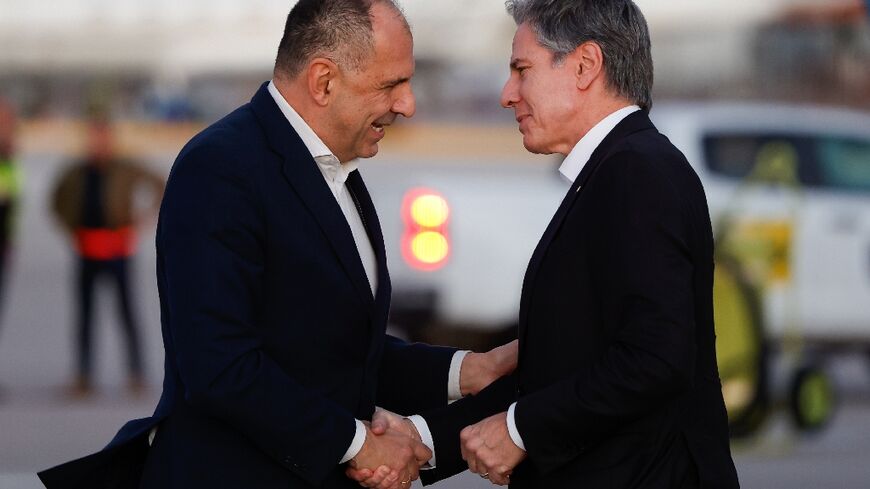 Greek Foreign Minister Giorgos Gerapetritis, left, greeted US Secretary of State Antony Blinken upon his arrival in Crete