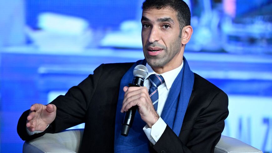 In this photograph taken on August 25, 2023, Dr Thani bin Ahmed Al Zeyoudi, Chair, WTO's 13th Ministerial Conference and Minister of State for Foreign Trade of United Arab Emirates, addresses the gathering on the first day of the three-day B20 Summit in New Delhi. 