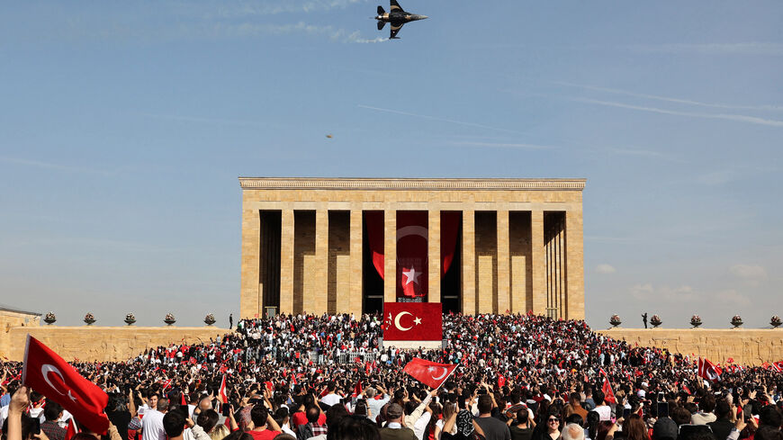 The Soloturk aerobatic demonstration team of the Turkish Air Force flies an F-16 aircraft over Anitkabir, the mausoleum of Turkish Republic's Founder Mustafa Kemal Ataturk, during celebrations to mark the 100th anniversary of the Republic of Turkey in Ankara, on October 29, 2023. Turkey marked its centenary as a post-Ottoman republic on October 29, 2023, with somewhat muted celebrations held in the shadow of Israel's escalating war with Hamas militants in Gaza. (Photo by Adem ALTAN / AFP) (Photo by ADEM ALT