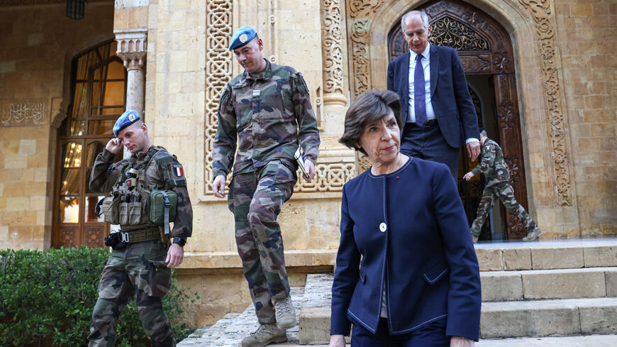 France's Minister of Foreign Affairs Catherine Colonna (2R) meets with soldiers of the French contingent of the United Nations Interim Force in Lebanon (UNIFIL), outside the Pine Residence, the French Ambassador's official residence in Beirut, on December 18, 2023. France's top diplomat is in Lebanon on December 18, for talks on de-escalating near-daily exchanges of fire on the Israel border, which have triggered fears of all-out conflict. (Photo by Anwar AMRO / AFP) (Photo by ANWAR AMRO/AFP via Getty Image