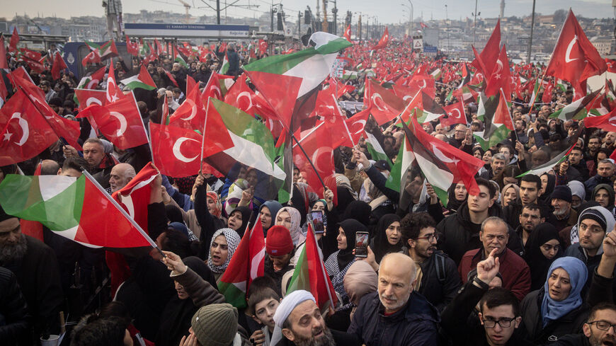 People take part in a solidarity protest over events happening in Gaza and the West Bank on January 01, 2024 in Istanbul, Turkey. As the world celebrated New Years, Israel warned that the ongoing offensive in Gaza could last months and continue through 2024.