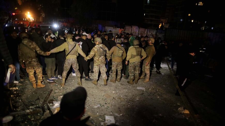 soldiers at Arouri strike site