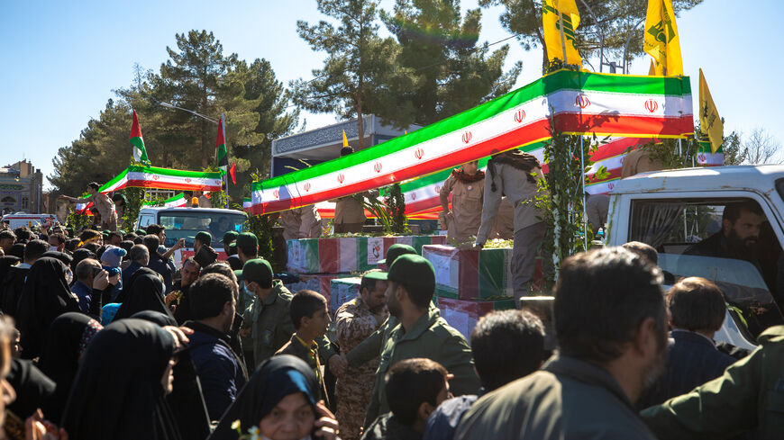 Iranian mourners gather during the funeral ceremony of yesterday's explosion, Kerman, Iran, Jan. 5, 2024.