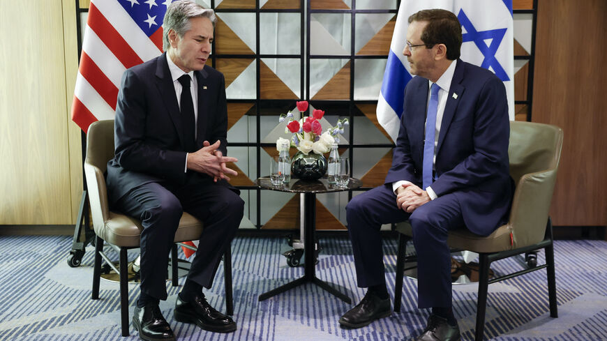 US Secretary of State Antony Blinken (L) meets with Israeli President Isaac Herzog in Tel Aviv on Jan. 9, 2024, during his week-long trip aimed at calming tensions across the Middle East, amid continuing battles between Israel and the Palestinian militant group Hamas in Gaza.