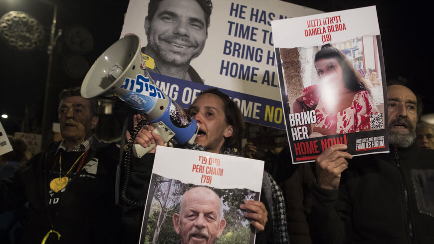 amlies of hostages and supporters hold signs and photos of hostages during a protest calling for an hostages deal with Hamas near the Israeli Prime Minister's residence on January 22, 2024in Jerusalem Israel. According to Israel, 132 hostages are still held by Hamas in Gaza since the October 7 attack. As the conflict between Israel-Hamas conflict rages on, the IDF focused the military offensive on Khan Younes, now the epicenter of the clashes in southern Gaza. For their part, families of hostages in Israel