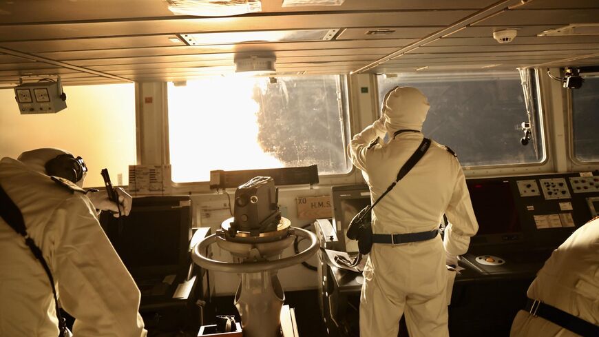 Crew members on Britain's HMS Diamond respond to Houthi missiles and drones in the Red Sea, Jan. 9, 2024.