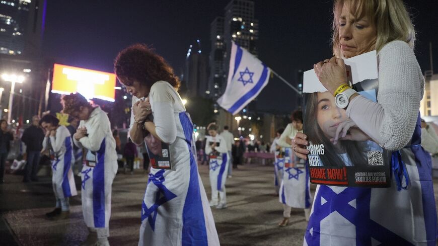 Families and supporters of Israeli hostages still held in Gaza rally in Tel Aviv to press the government to secure their release