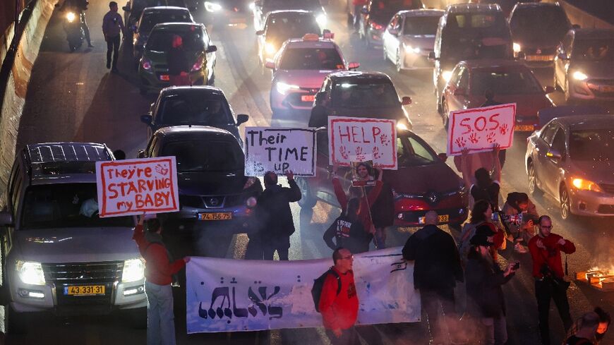 Demonstratos calling for hostage release block a major Tel Aviv highway