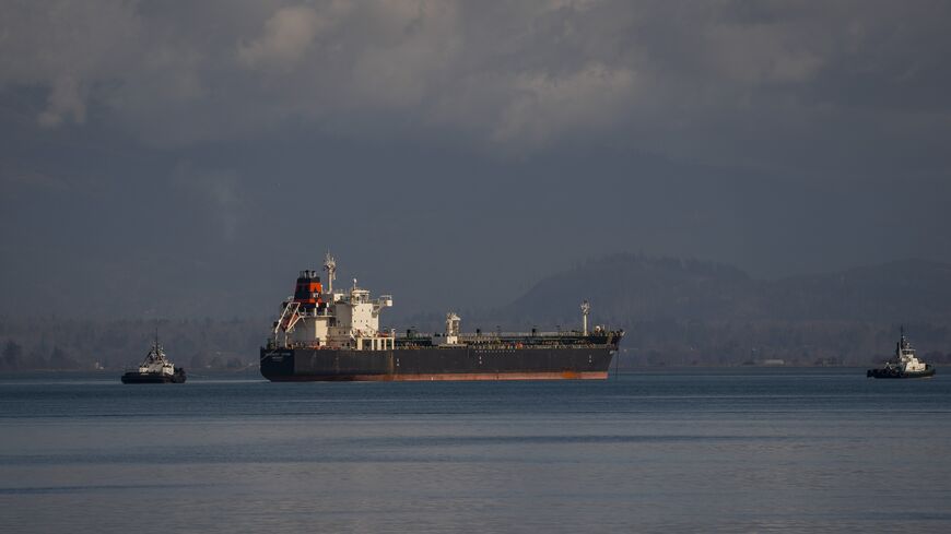 An oil tanker waits near the Marathon Anacortes Refinery, operated by Marathon Petroleum, in Anacortes, Washington, March 8, 2022.