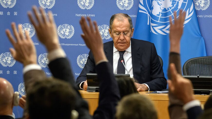 TOPSHOT - Reporters ask questions as Russia's Foreign Minister Sergey Lavrov holds a press conference following his address to the 78th United Nations General Assembly at UN headquarters in New York City on September 23, 2023. Western powers through their support to Ukraine have effectively entered direct war against Moscow, Russian Foreign Minister Sergei Lavrov said Saturday. "You can call it anything you want, but they are fighting with us, they are straight-up fighting with us. We call it a hybrid war,