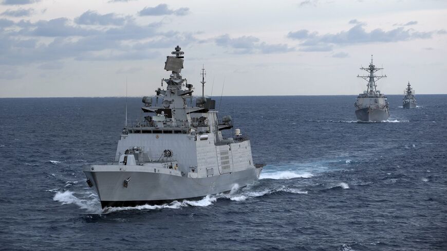The Indian Navy frigate INS Satpura (F48) is underway with the Ticonderoga-class guided-missile cruiser USS Bunker Hill (CG 52) and the Arleigh Burke-class guided-missile destroyer USS Halsey (DDG 97) during Exercise Malabar 2012.