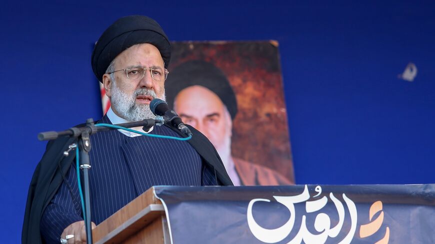 Iranian President Ebrahim Raisi speaks during the funeral ceremony for victims of twin explosions near the cemetery where the grave of Iran's former top military commander Gen. Qassem Soleimani is located on Jan. 05, 2024, in Kerman, Iran. 