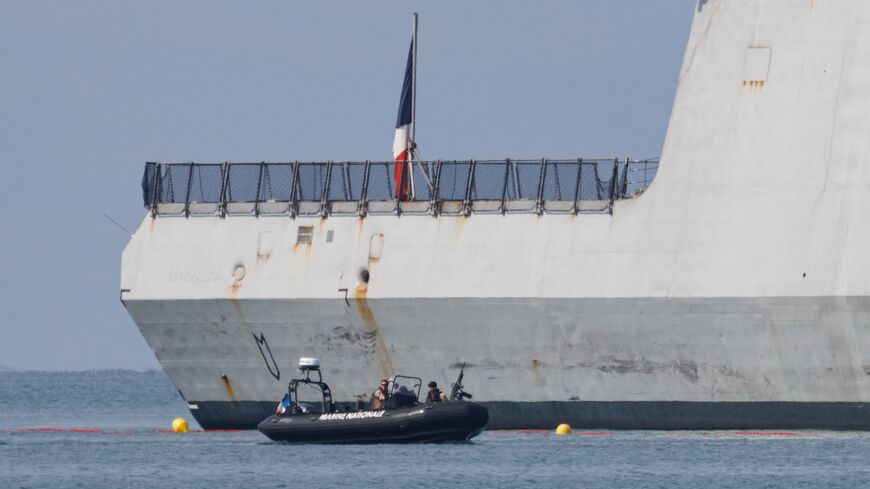 French marines patrol the area around the French navy frigate, the FS Languedoc.