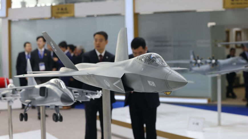 Visitors attend the 'World Defense Show 2024', north of the Saudi capital Riyadh on February 4, 2024. (Photo by Fayez Nureldine / AFP) (Photo by FAYEZ NURELDINE/AFP via Getty Images)