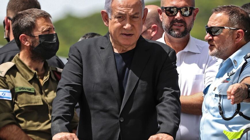 Israeli Prime Minister Benjamin Netanyahu, minister Amir Ohana and police chief Yaakov Shabtai, at the Mount Meron site