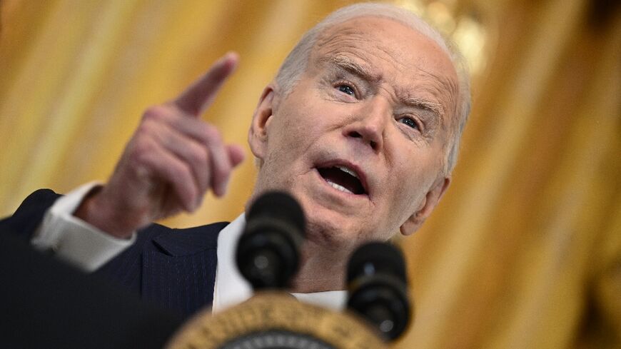 US President Joe Biden speaks during a reception honoring Women's History Month at the White House