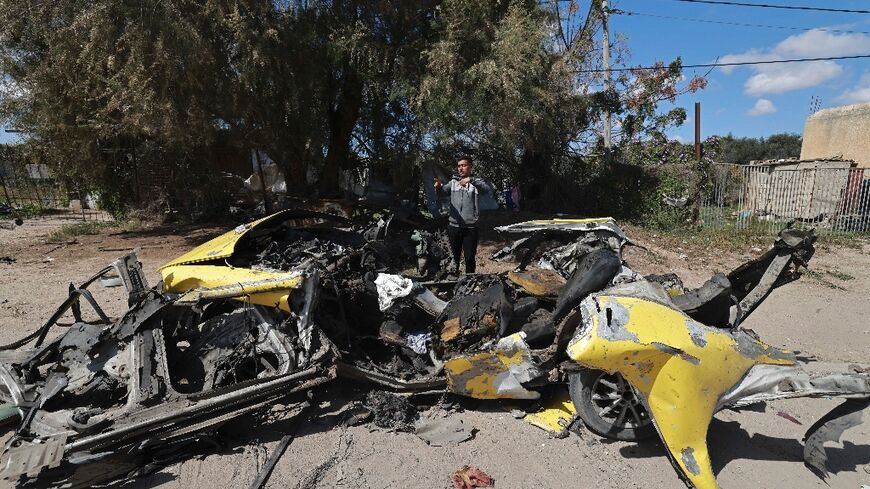 A car destroyed by Israeli bombardment in Rafah, the crowded southern Gaza Strip area where around 1.5 million people have sought refuge