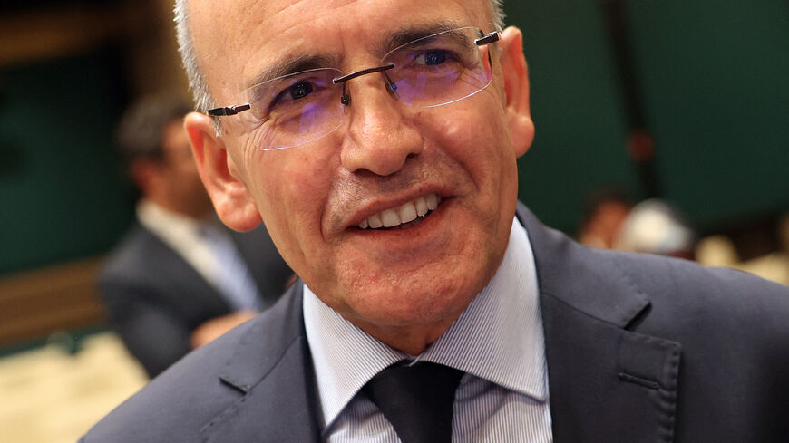 Turkish Treasury and Finance Minister Mehmet Simsek looks on before the press conference following the cabinet meeting held at the Presidential Complex in Ankara on August 21, 2023. (Photo by Adem ALTAN / AFP) (Photo by ADEM ALTAN/AFP via Getty Images)