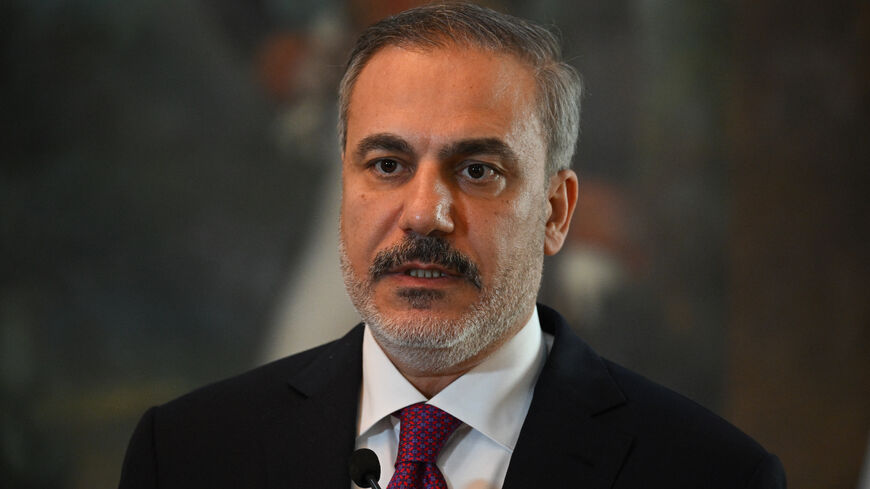 Turkish Minister of Foreign Affairs Hakan Fidan speaks during a press conference at the Ministry of Foreign Affairs of Venezuela in Caracas on Feb. 24, 2024.