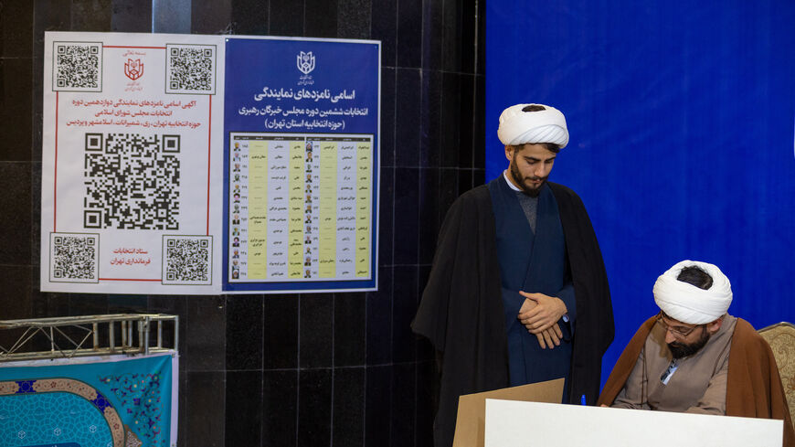 Iranians participate in the 12th term parliamentary elections and the 6th term Assembly of Leadership Experts' voting at a Tehran polling station on March 01, 2024. The elections encompass both parliamentary and Assembly of Experts' ballots, crucial for Iran's leadership selection and oversight. (Photo by Hossein Beris / Middle East Images / Middle East Images via AFP) (Photo by HOSSEIN BERIS/Middle East Images/AFP via Getty Images)