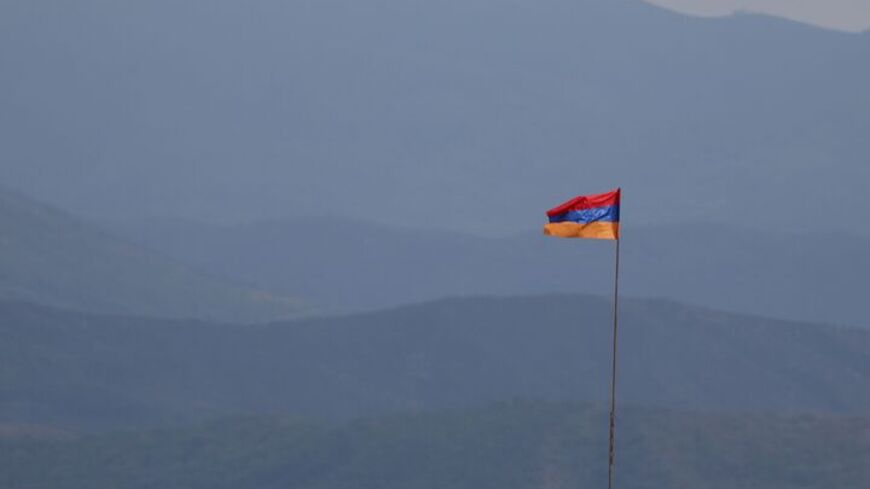 This photograph taken on Sept. 22, 2023, shows an Armenian flag fluttering near the border with Azerbaidjan near Kornidzor. 