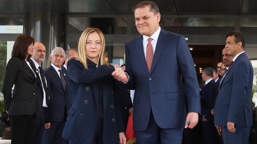 Italy's Giorgia Meloni being welcomed by interim Prime Minister Abdulhamid Dbeibah