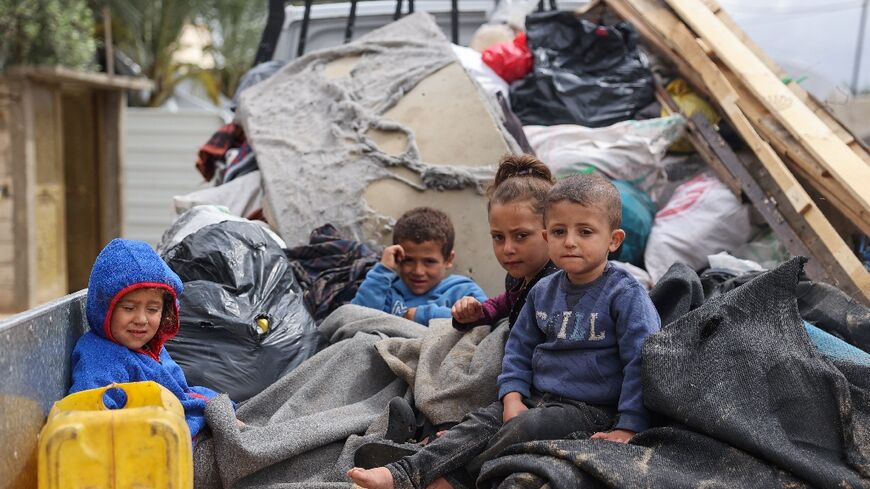 Displaced Palestinians in Rafah in the southern Gaza Strip packed their belongings and prepared to move after an evacuation order from the Israeli military