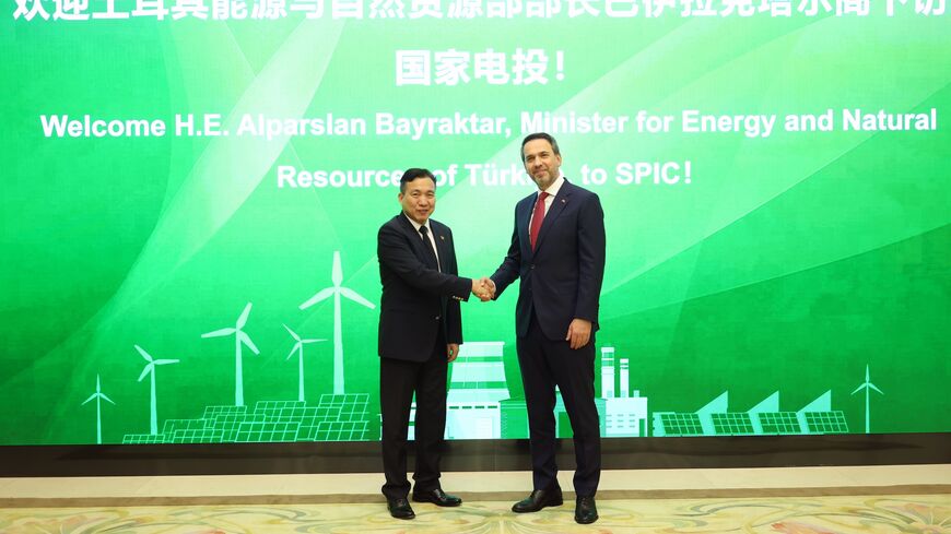 Turkish Energy Minister Alparslan Bayraktar and the head of China's National Energy Administration in Beijing on May 22, 2024.