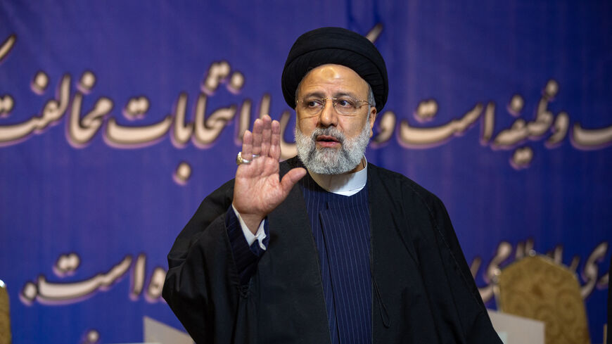 Ebrahim Raisi, the president of Iran participate in the 12th term parliamentary elections and the 6th term Assembly of Leadership Experts' voting at a Tehran polling station on March 01, 2024. The elections encompass both parliamentary and Assembly of Experts' ballots, crucial for Iran's leadership selection and oversight. (Photo by Hossein Beris / Middle East Images / Middle East Images via AFP) (Photo by HOSSEIN BERIS/Middle East Images/AFP via Getty Images)