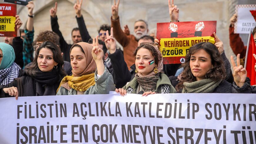 People are gathered to protest cooperation between Turkey and Israel.