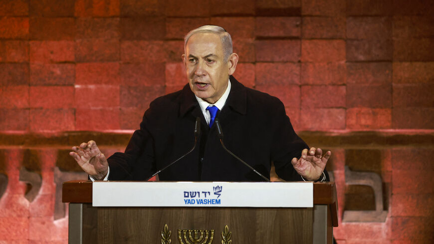 Israel's Prime Minister Benjamin Netanyahu speaks during a ceremony marking Holocaust Remembrance Day for the six million Jews killed during World War II, at the Yad Vashem Holocaust Memorial in Jerusalem on May 5, 2024. (Photo by Menahem Kahana / AFP) (Photo by MENAHEM KAHANA/AFP via Getty Images)