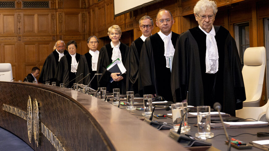 Court's president Joan Donoghue (C) and associate judges arrive to hear South African arguments to the International Court of Justice (ICJ) as part of South Africa case against Israel over Rafah offensive in The Hague, on May 16, 2024.