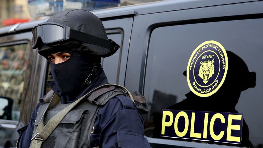 An Egyptian policeman stands guard on Cairo's landmark Tahrir Square on Jan. 25, 2017. 