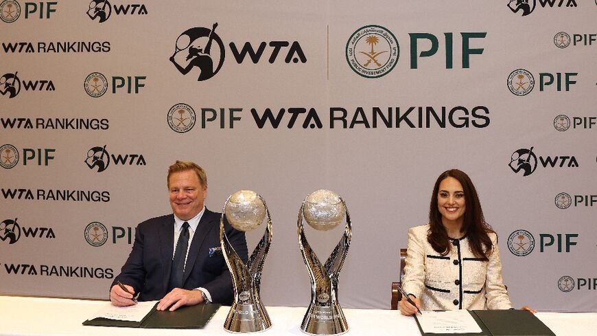 Kevin Foster, Head of Corporate Affairs for the Saudi Public Investment Fund and and Marina Storti, chief executive of WTA Ventures, announce a new multi-year partnership between the women's tennis circuit and PIF